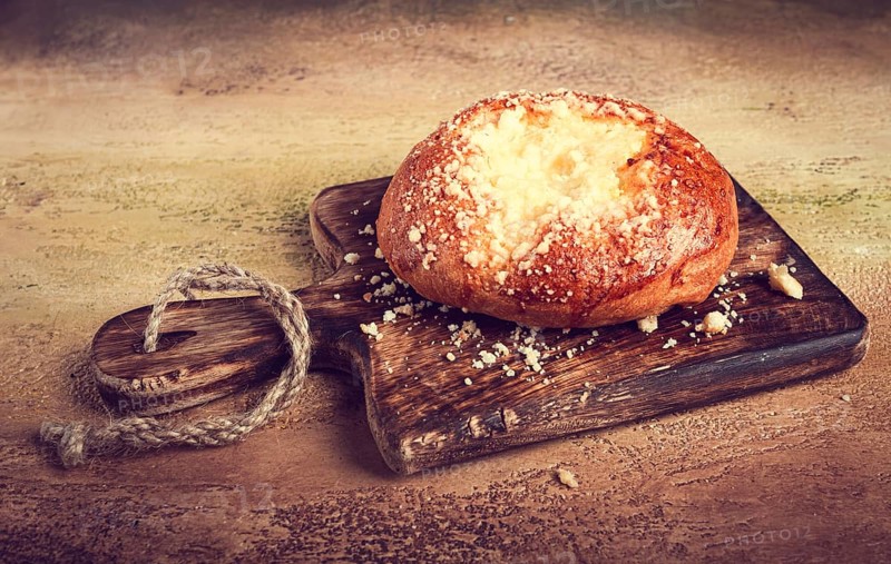 Bun with cottage cheese, pastries, cheesecake, no people