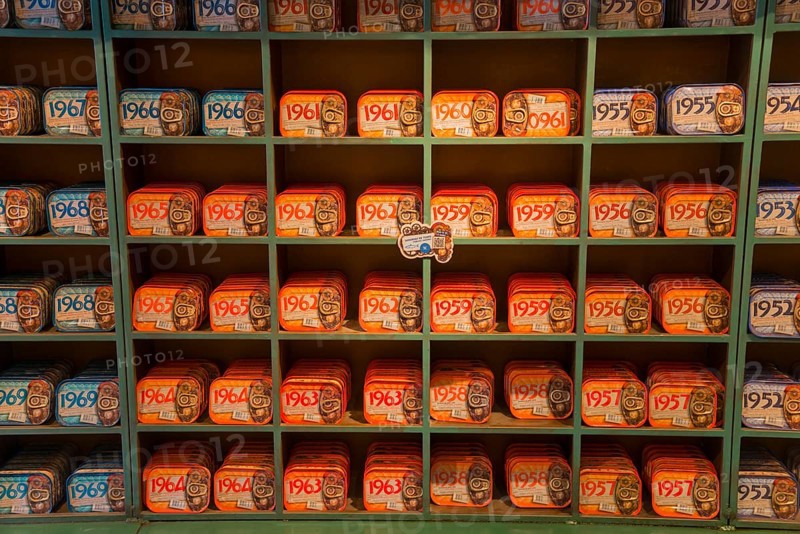 Shelves filled with a variety of colourful and artistically designed sardine tins that have a nostalgic charm, canned sardines, Óbidos, Obidos, Oeste, Centro, Estremadura, Portugal, Europe