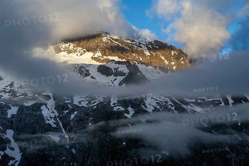 Cloudy mountain landscape in dramatic morning light, Griesferner peak with snow, Berliner Höhenweg, Zillertal, Tyrol, Austria, Europe
