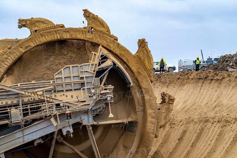Opencast lignite mine Garzweiler 2, bucket wheel excavator 261 excavating the surface, at the rest of the hamlet Lützerath, bucket diameter is 17 metres, Erkelenz, North Rhine-Westphalia, Germany, Europe