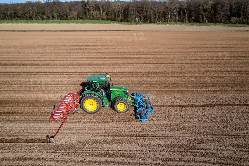 Sugar beet being sown in spring, precision sowing with precision seed drill, behind a tractor, Niederkrüchten, North Rhine-Westphalia, Germany, Europe