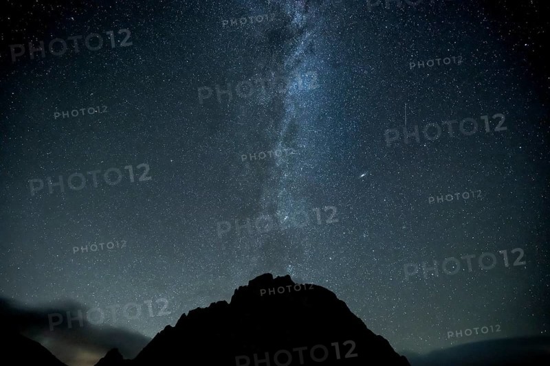 Milky Way and starry sky with Montafon mountains, Tschagguns, Rätikon, Montafon, Vorarlberg, Austria, Europe
