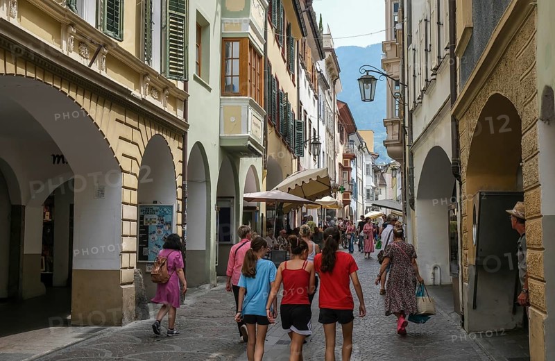 Merano, South Tyrol, Italy, passers-by stroll through the Laubengasse, the arcades are the heart of the old town centre, Europe