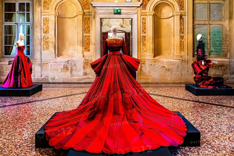 Red silk Mikado wedding dress in various shades of red with embroidered bodice, 2009, exhibition of magnificent evening dress creations by fashion designer Roberto Capucci, 17th century Villa Manin, residence of Ludovico Manin, Codroipo, Friuli, Italy, Codroipo, Friuli, Italy, Europe