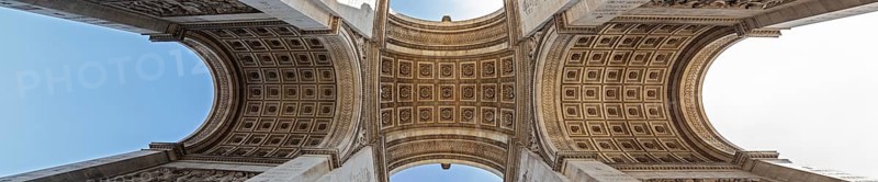 Panoramic view of the interior of the Arc de Triomphe with impressive symmetry, Paris