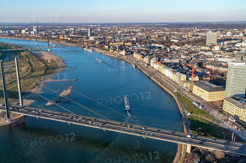 View over the city centre of Düsseldorf, Rheinkniebrücke over the Rhine, Altstadtufer, from North Rhine-Westphalia, Germany, Europe