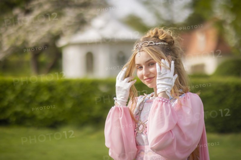 Cinderella can also be seen around Moritzburg Castle in spring. Model Tamara Kretschmer once again slipped into the coveted role of the legendary Cinderella with the ball gown, Moritzburg, Saxony, Germany, Europe