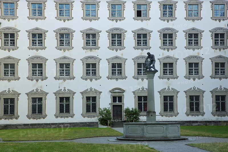 Inner courtyard with fountain and baroque illusion architecture, illusion painting, window, row, series, grey house wall, decorations, monastery, castle, Salem, Lake Constance area, Baden-Württemberg, Germany, Europe