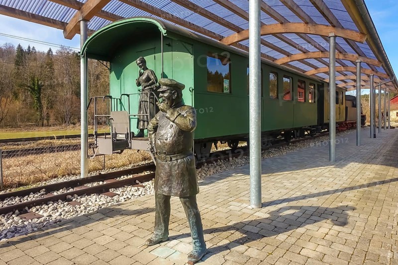 Durlesbach railway station, opened in 1849 and decommissioned in 1984, railway monument, railway memorial, group of figures by the artist René Auer, group of sculptures, scene from the song Auf de schwäbische Eisebahne, conductor, Konduktör, s Weible, Frau, bronze figures, Königlich Württembergische Staats-Eisenbahnen, art in public space, Durlesbach, Reute, Bad forest lake, Upper Swabia, Baden-Württemberg, Germany, Europe