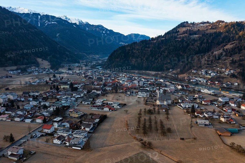 Drone shot, view of village with parish church, Prutz, Kaunertal, Inntal, Tyrol, Austria, Europe