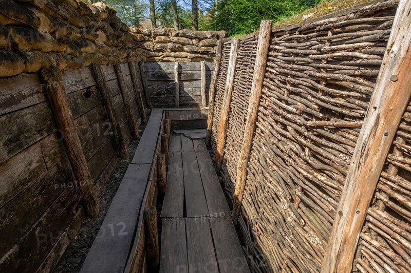 German WW1 trench showing fire step, wooden duckboards and woven wickerwork branches at the Passchendaele Museum, Zonnebeke, West Flanders, Belgium, Europe