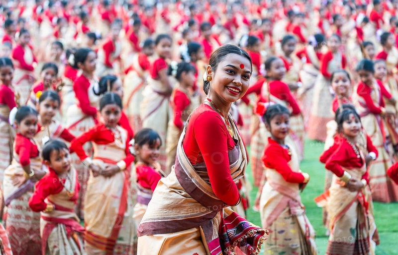 An instructor dance as participants follows the dance step in a Bihu dance workshop ahead of Rongali Bihu Festival, in Guwahati, India on 8 April 2025
