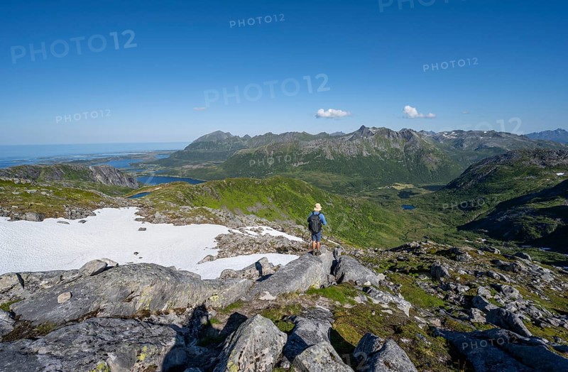 View of mountains and fjord landscape, mountain panorama, mountaineer at the summit of Rundfjellet, Svolvaer, Nordland, Norway, Europe