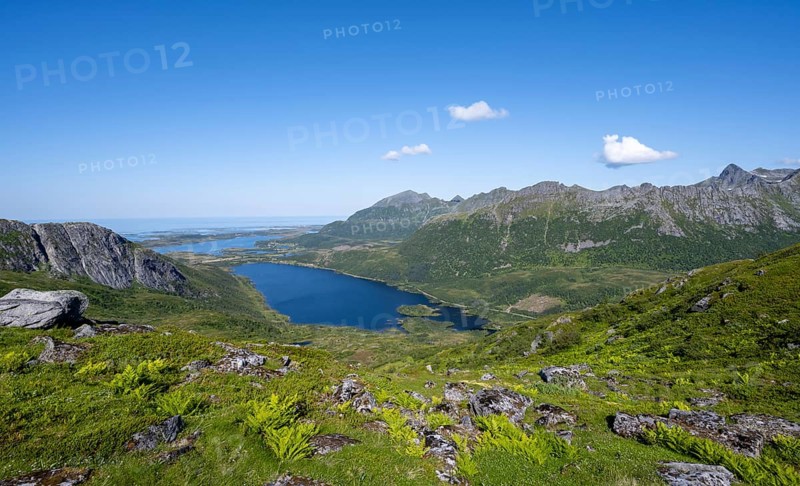 View of mountain landscape and valley with lakes, hiking trail to the summit of Rundfjellet, Svolvaer, Nordland, Norway, Europe