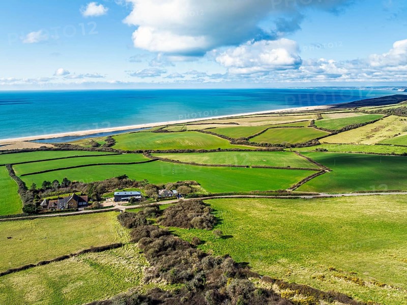 Farms over Swyre and West Bexington from a drone, West Bexington Nature Reserve, S W Coast Path, Dorchester, Dorset, England, United Kingdom, Europe