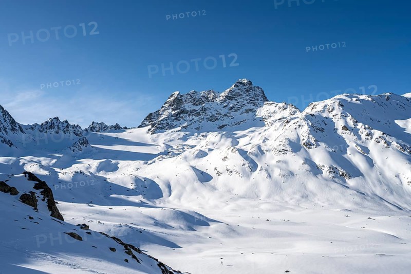 Mountain peak Piz Kesch with snow, view at the Kesch hut in winter, Grisons Haute Route, Albula Alps, Rhaetian Alps, Grisons, Eastern Switzerland, Switzerland, Europe