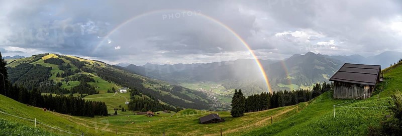 View over the Brixen Valley with rainbow, Hochbrixen, Brixen im Thale, Kitzbühel Alps, Tyrol, Austria, Europe