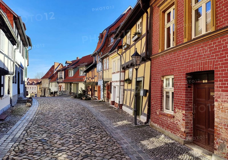 Half-timbered houses with cobblestones in Wassertorstraße, Old Town of the World Heritage City of Quedlinburg, Saxony-Anhalt, Germany, Europe