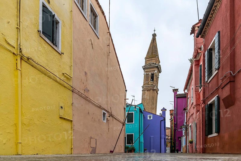 City view of Burano with colourfully painted houses and canals. Slate church tower Campanile, Burano, Venice, Venezia, Italy, Europe