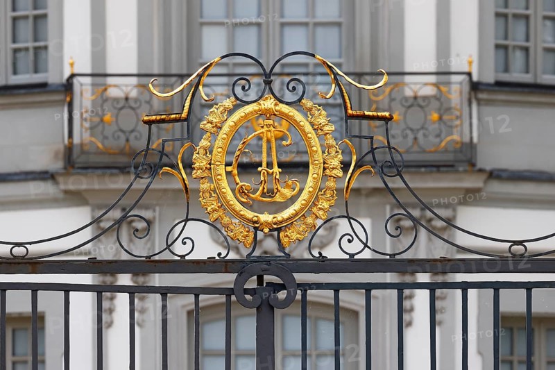 Golden coat of arms on the Falkenlust hunting lodge, Elector and Archbishop Clemens August, west façade, UNESCO World Heritage Site, Brühl, North Rhine-Westphalia, Germany, Europe