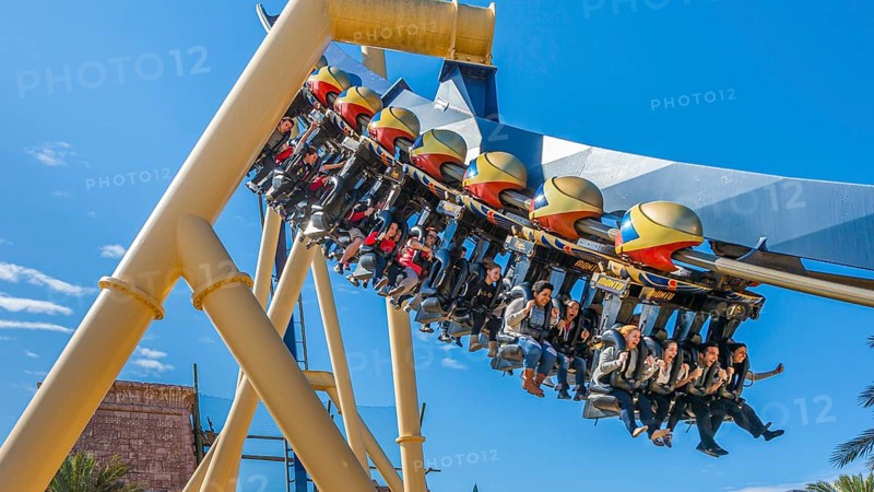Park guests riding Montu roller coaster at Busch Gardens in Tampa, Florida, USA, North America