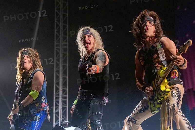 Copenhagen, Denmark - 19.6.2024: Spyder (bassist), Michael Starr (singer) and Satchel (guitarist) from the band Steel Panther at the Copenhell Metal Festival at Kløverparken Camping Copenhagen, Denmark. The festival will take place from 19-22 June 2024