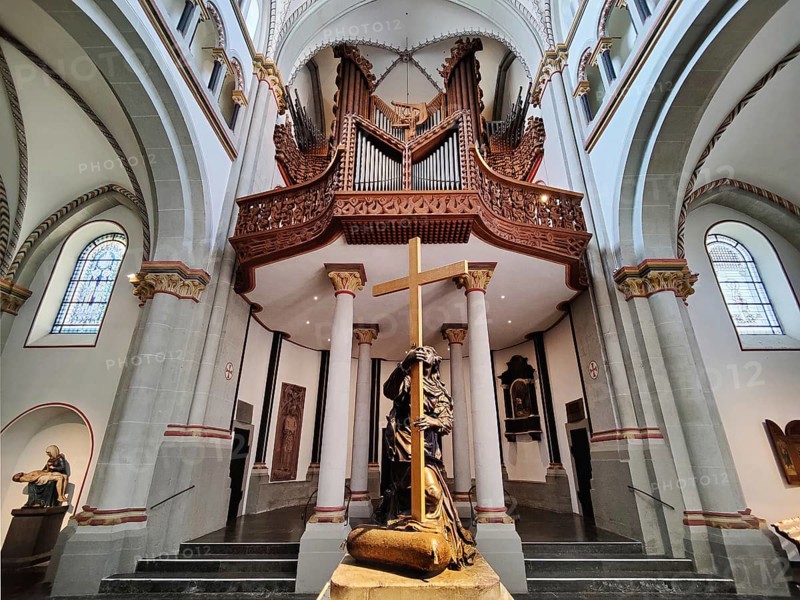 Interior view of Bonn Minster, bronze statue of St Helena with Klais organ in the west apse, Bonn, North Rhine-Westphalia, Germany, Europe