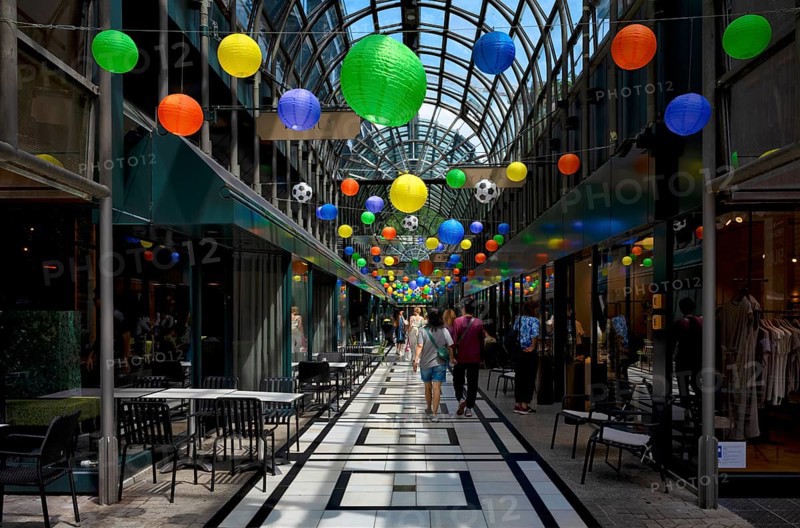 Calwer Passage, shopping arcade, shopping centre, decorated, roofed, lanterns, footballs, decoration, passers-by, Stuttgart, Baden-Württemberg, Germany, Europe