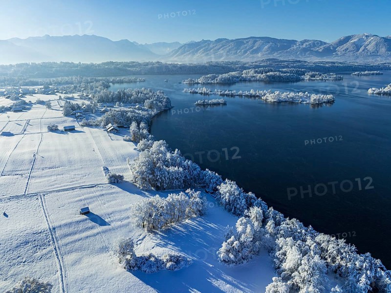 Aerial view of a lake in front of mountains, winter, snow, morning light, fog, Staffelsee, Alpine foothills, Upper Bavaria, Bavaria, Germany, Europe