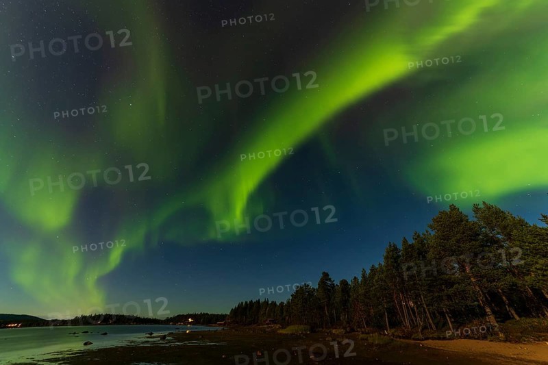 Northern lights, (Aurora borealis) at a lake near Kiruna, September 2024, Lapland, Sweden, Europe