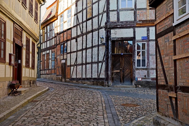 Half-timbered houses in the Finkenherd alley with cobblestones, Old Town of the World Heritage town of Quedlinburg, Saxony-Anhalt, Germany, Europe