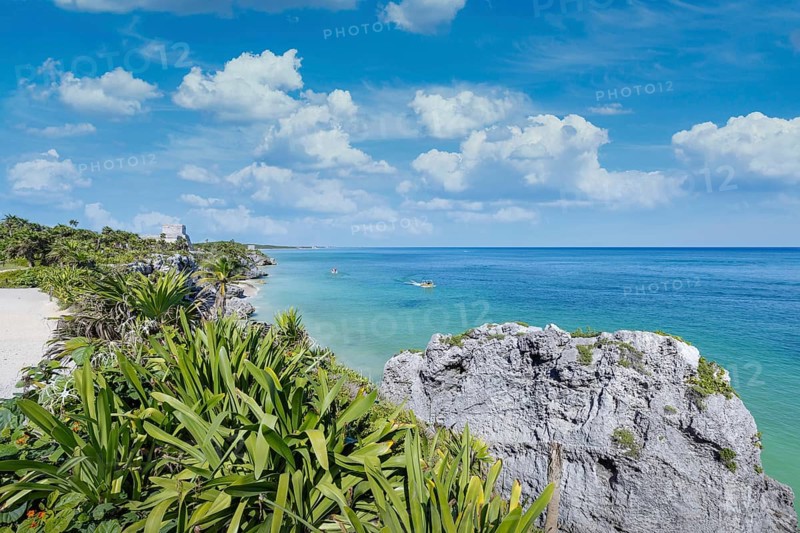 Tulum Archaeological Zone with Mayan pyramids and ruins located on the scenic ocean shore of Quintana Roo province