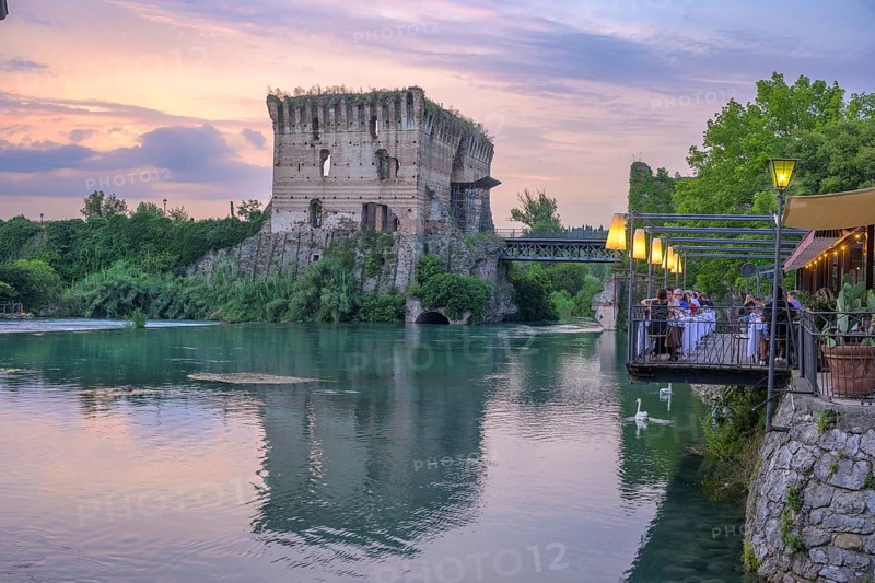 Restaurant on the Mincio River and Visconti Bridge dating back to 1395, Borghetto, Valeggio sul Mincio, Province of Verona, Italy, Europe