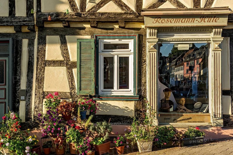 Idyllic old half-timbered house with floral decorations and shop window of milliner, milliner, hat maker, hat salon Rosemann, hat shop, old town, Bad Homburg vor der Höhe, Hesse, Germany, Europe