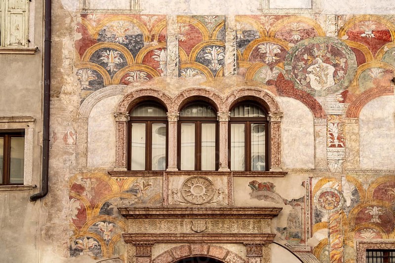 The painted façade of the Palazzo Quetta - Alberti Colico palace in Trento, Trentino, Italy, Europe