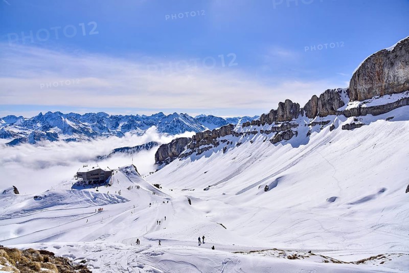On the right the rock faces of the Hoher Ifen (2230 m) in Kleinwalsertal, on the left the mountain station of the Ifen mountain railway on the Gottesacker plateau, Allgäu, Vorarlberg, Austria, Europe