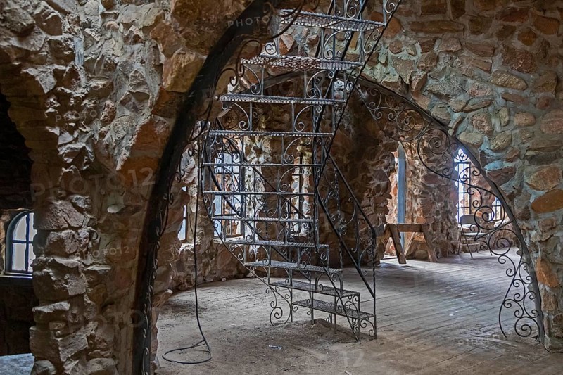 Rye, Colorado, An ornamental iron stairway in Bishop Castle. The Castle is an elaborate stone and metal structure and roadside attraction. It is being built by Jim Bishop in the mountains of San Isabel National Forest