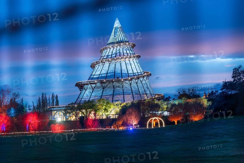 Red band of clouds passes the illuminated millennium tower in the Elbauenpark, landmark, Magdeburg, Saxony-Anhalt, Germany, Europe
