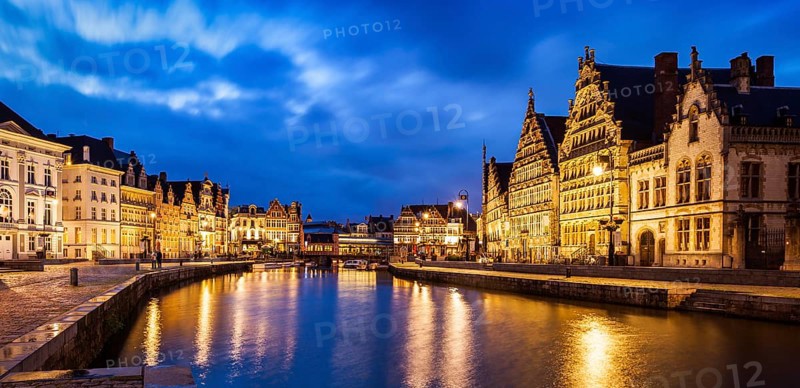 Panorama of Ghent canal, Graslei and Korenlei streets in twlight the evening. Ghent, Belgium, Europe