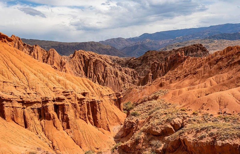 Eroded mountain landscape with sandstone cliffs, canyon with red and orange rock formations, Konorchek Canyon, Chuy, Kyrgyzstan, Asia