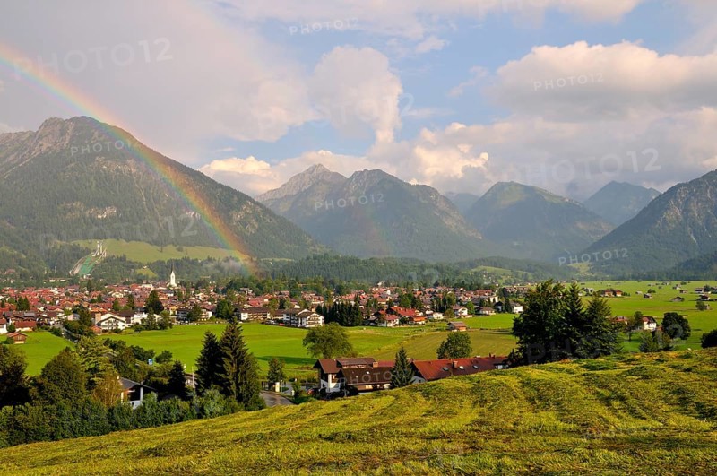 View over Oberstdorf with rainbow and Allgäu Alps, Oberallgäu, Bavaria, Germany, Europe