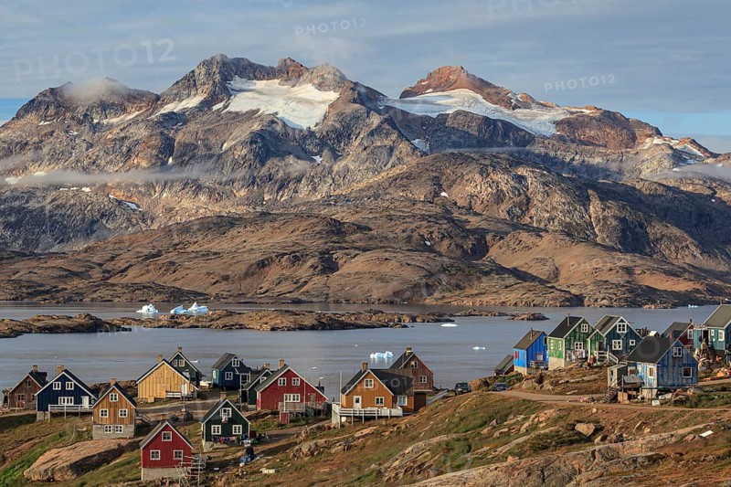 Inuit settlement at a fjord with icebergs, mountainous, autumn, sunny, Tasiilaq, East Greenland, Greenland, North America
