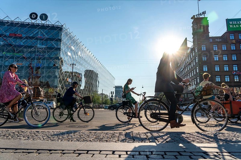 Cyclists on cycle paths, Radhuspladsen, City Hall Square, H.C. Andersen's Boulevard, in the city centre of Copenhagen, considered the cycling capital of the world, 45% of the population travel by bike, Denmark, Europe