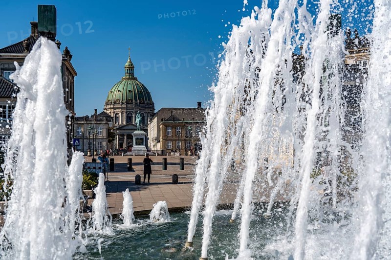 Amalienborg Palace, fountains in the Amalie Garden, dome of the Protestant Frederiks Kirke, Copenhagen, Denmark, Europe