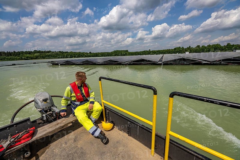 Germany's largest floating solar power plant on the Silbersee III, a quarry pond no longer used for sand mining, near Haltern am See, operated by Quarzwerke GmbH, around 5800 solar modules, on an area of a good 2 football pitches, generate 3.1 megawatts of power, the company uses the electricity itself on weekdays, at weekends it flows into the public grid, North Rhine-Westphalia, Germany, Europe