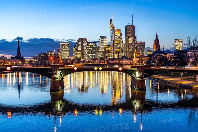 Skyline of the city centre of Frankfurt am Main, river Main, dusk, Ignatz-Bubis-Brücke, Hesse, Germany, Europe