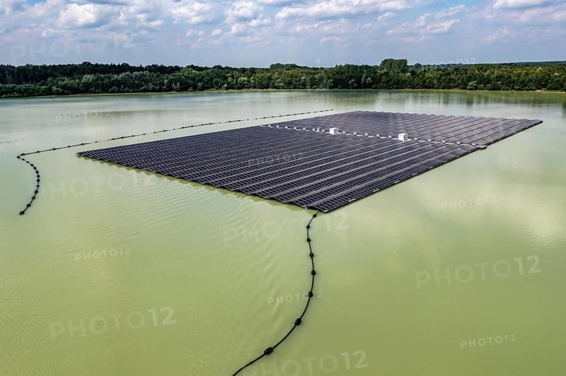 Germany's largest floating solar power plant on the Silbersee III, a quarry pond no longer used for sand mining, near Haltern am See, operated by Quarzwerke GmbH, around 5800 solar modules, on an area of a good 2 football pitches, generate 3.1 megawatts of power, the company uses the electricity itself on weekdays, at weekends it flows into the public grid, North Rhine-Westphalia, Germany, Europe