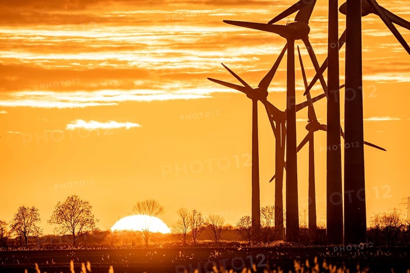 Wind farm near the East Frisian town of Norden, east of the town, sunset, Lower Saxony, Germany, Europe