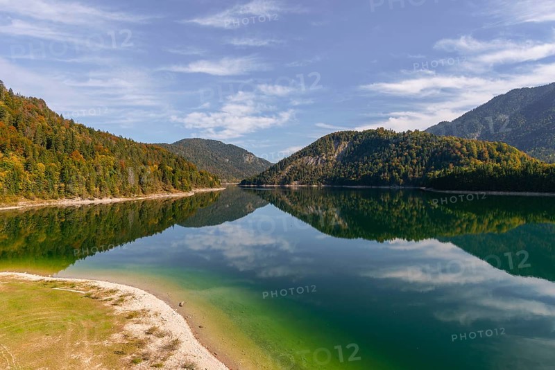 Intake structure at the Sylvenstein reservoir is used for flood protection, dams the Isar, power station, power generation, forest, water reflection, blue sky