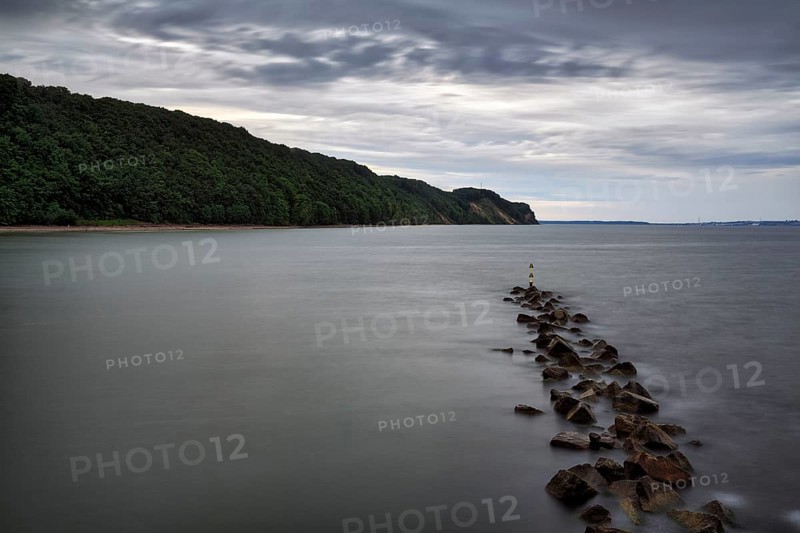 Coastal protection made of boulders, coastline on the Baltic Sea, dusk, long exposure, Baltic Sea resort Sellin, Rügen Island, Mecklenburg-Western Pomerania, Germany, Europe